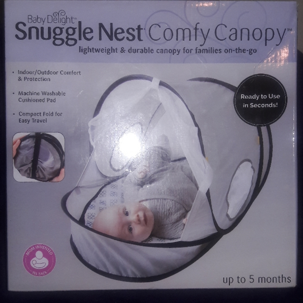 Snuggle nest comfy canopy for a baby